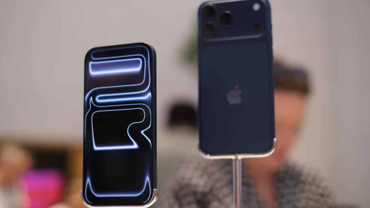 Two smartphones displayed with glowing abstract design.