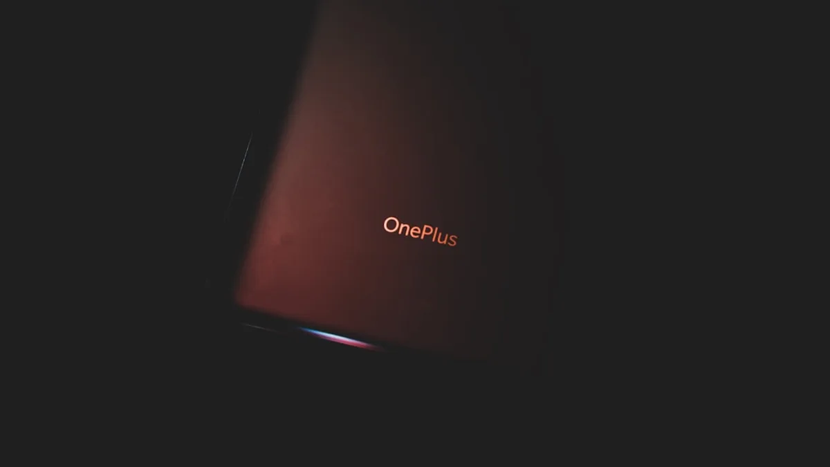 red lenovo laptop computer on white surface