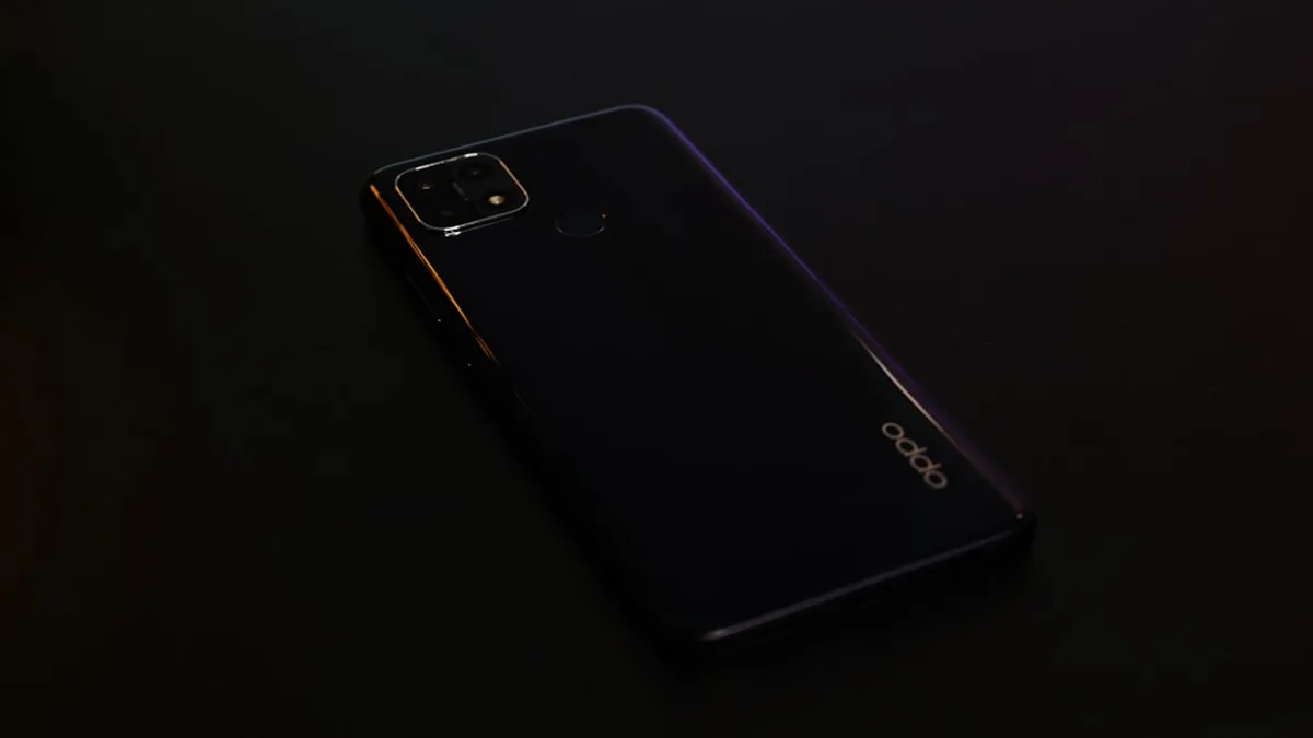 black samsung android smartphone on black surface