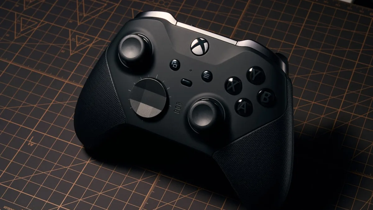 a close up of a controller on a table