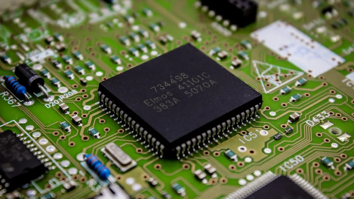 a close up of a computer chip on a printed circuit board