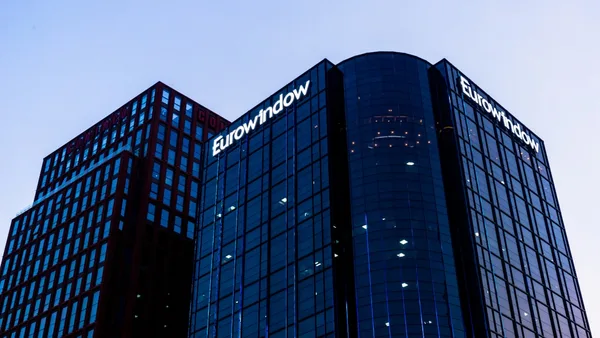 blue and black glass walled building