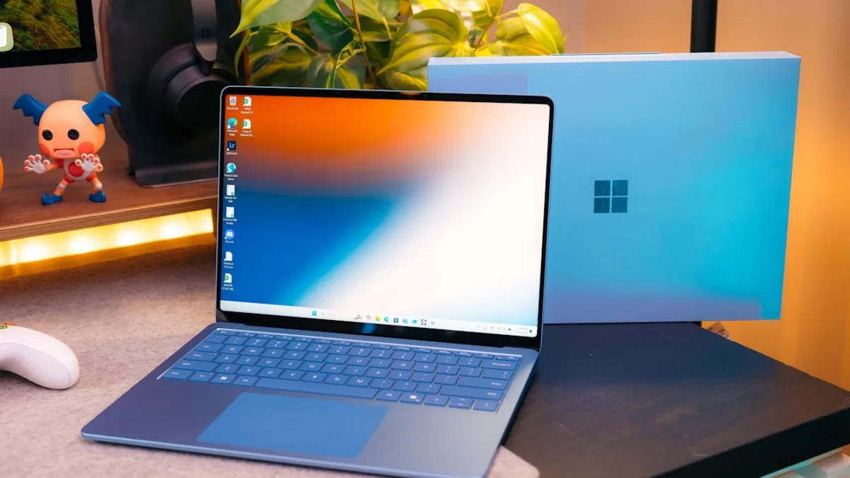 A laptop computer sitting on top of a desk