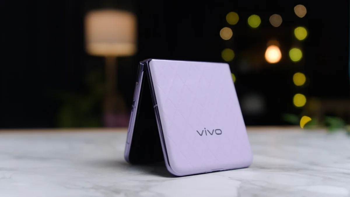 a close up of a cell phone on a table