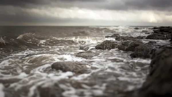 waves crashing against rocks