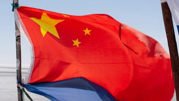 a bunch of flags that are next to each other