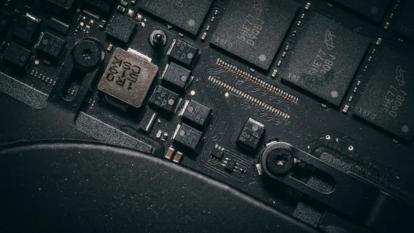 Close-up of a computer motherboard with many components.