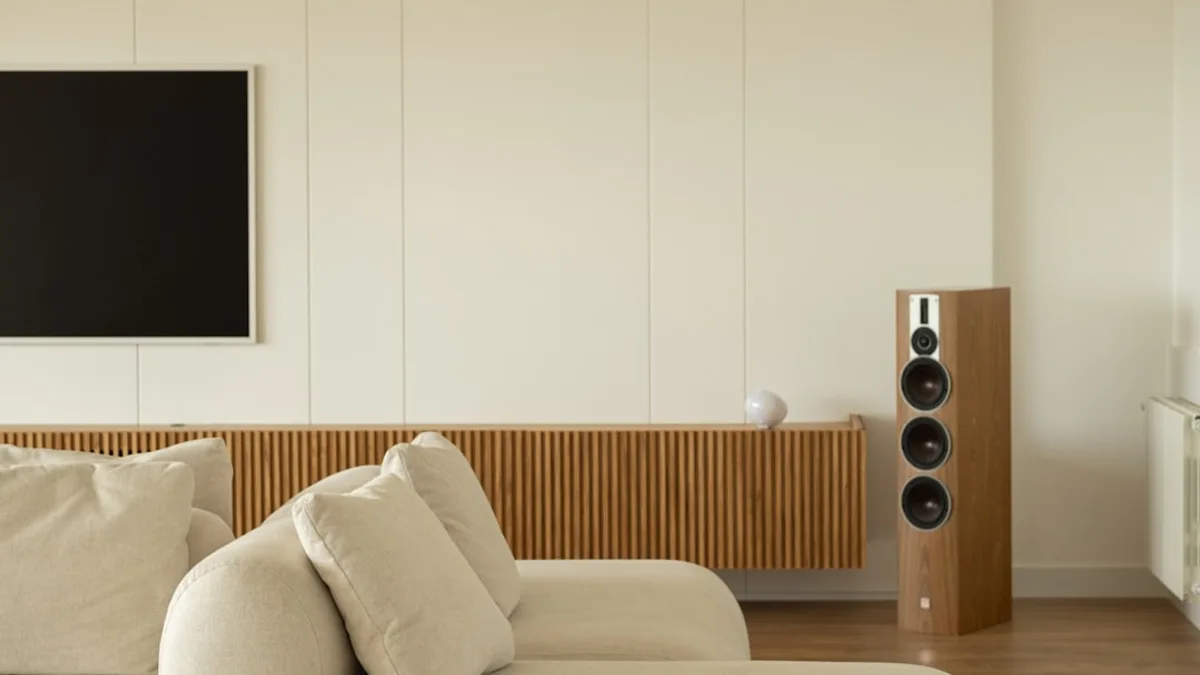 Modern living room with sectional sofa and speaker