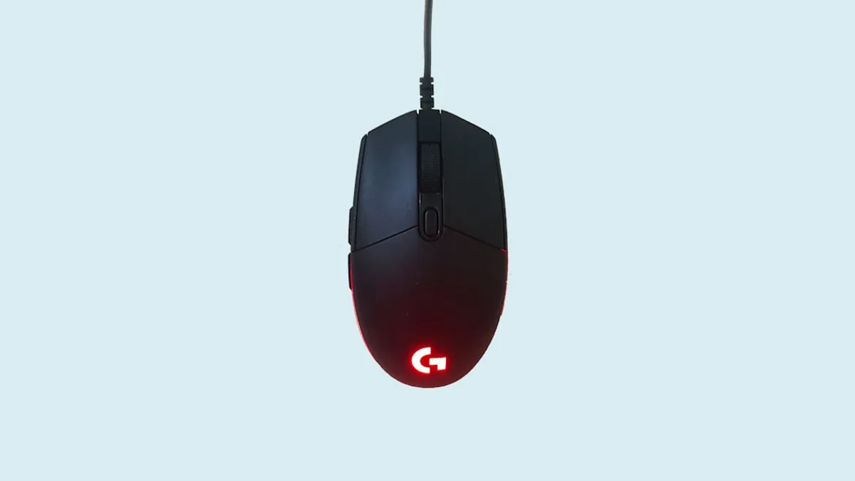 black and red corded computer mouse