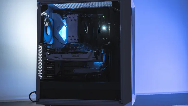 a computer with a blue light