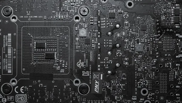 a black and white photo of a computer motherboard