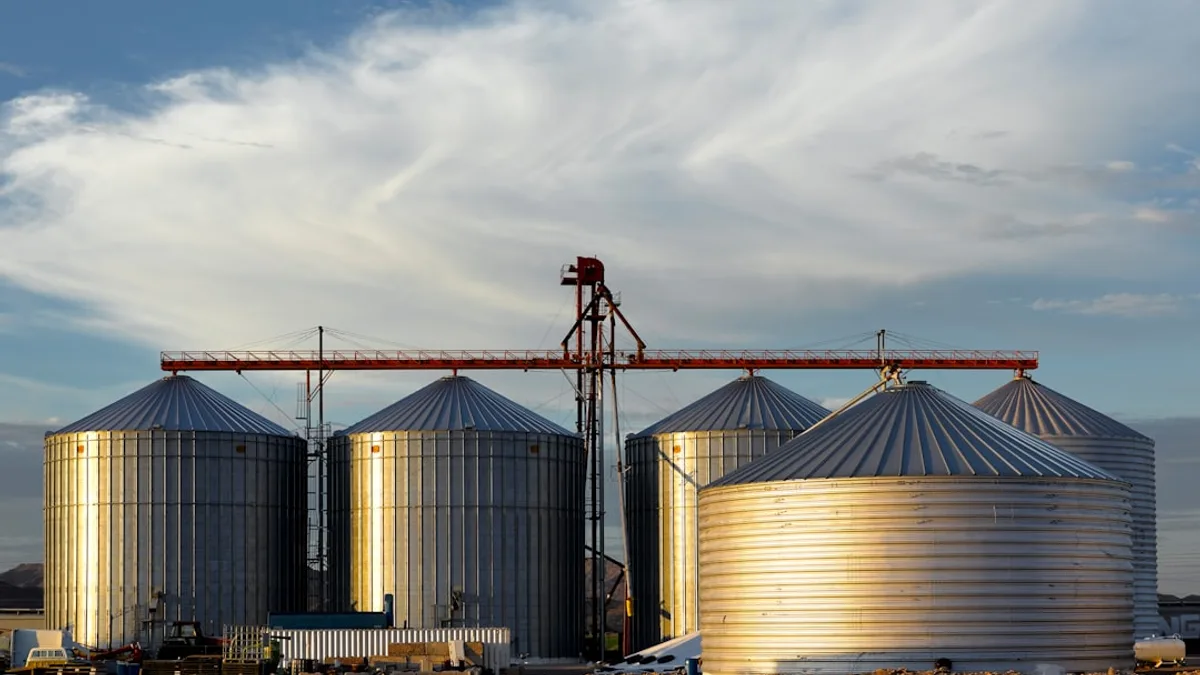 a group of large metal tanks sitting next to each other