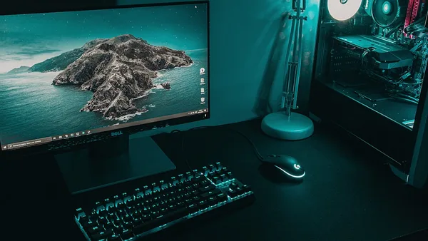black flat screen computer monitor beside black computer keyboard