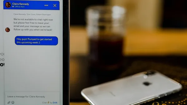 silver iPhone X on brown surface